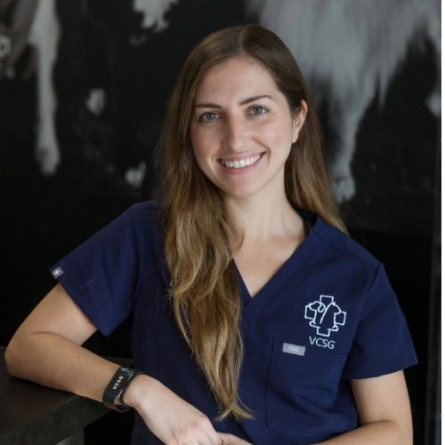 Dr Pico in dark blue Scrubs
